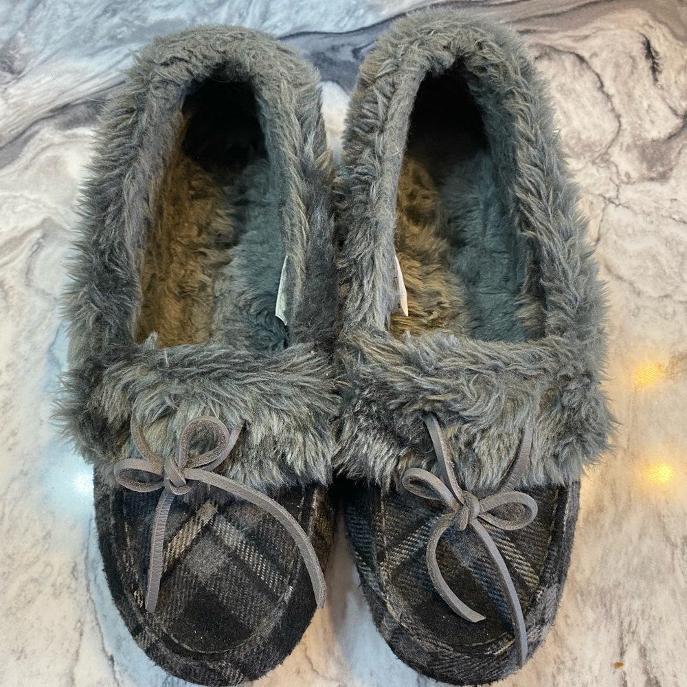 Vionic moccasin-like slippers.